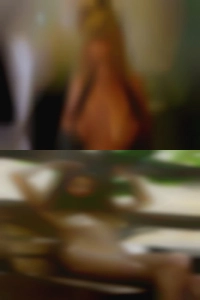 Whipping a naked women woman.